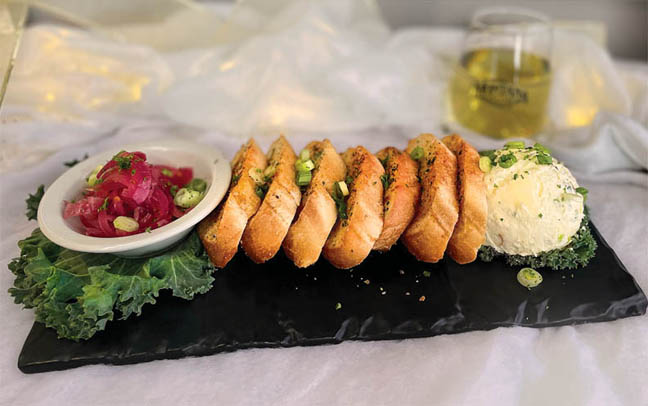 Caramelized shallot and chive boursin cheese with crostini 2 Caramelized shallot and chive boursin cheese with crostini 2